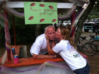 Daughter Melissa, or "Precious Angel," was the first in line at the kissing booth.